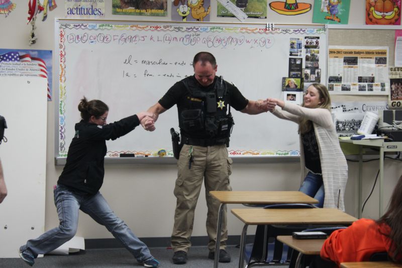 students attempt takedown of deputy